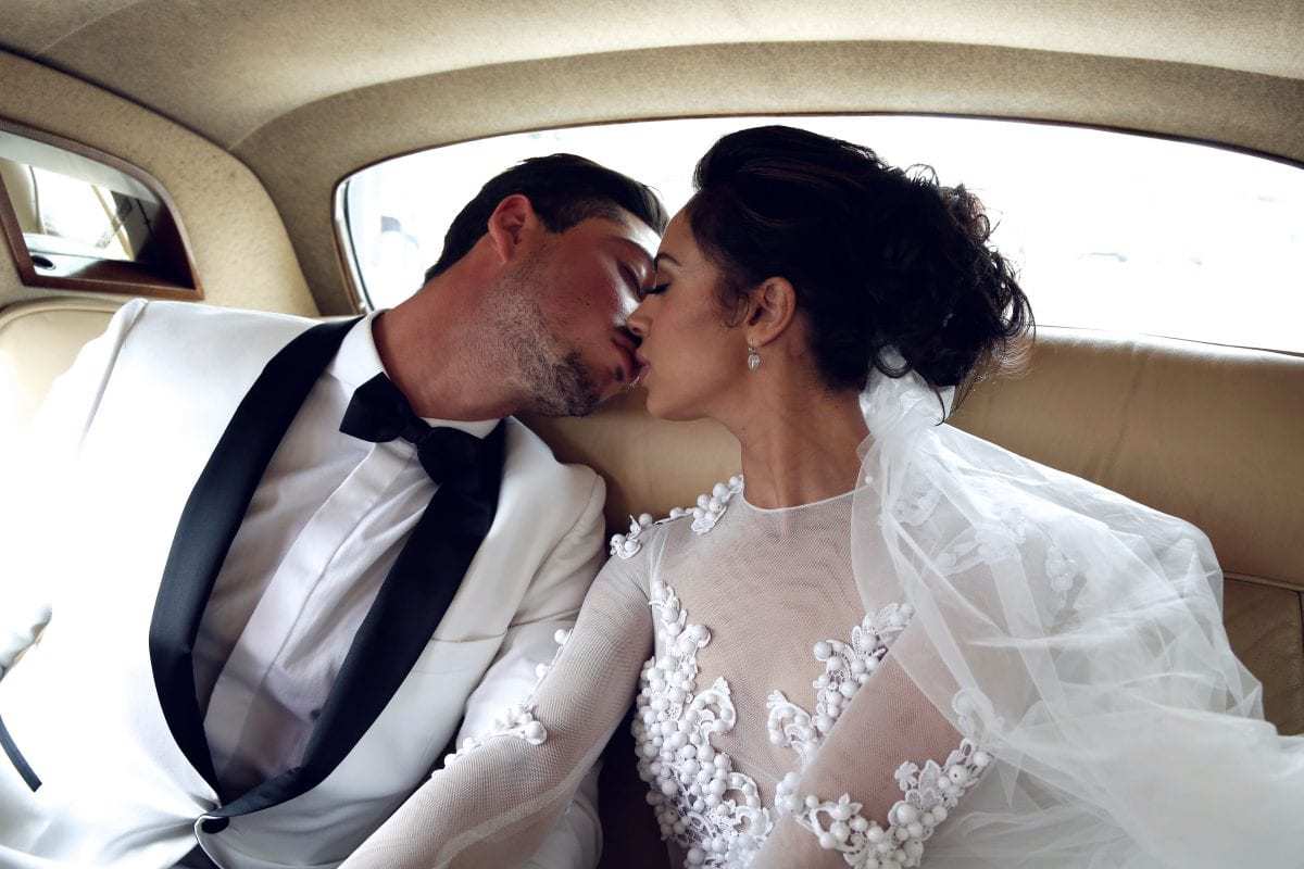 couple in wedding car