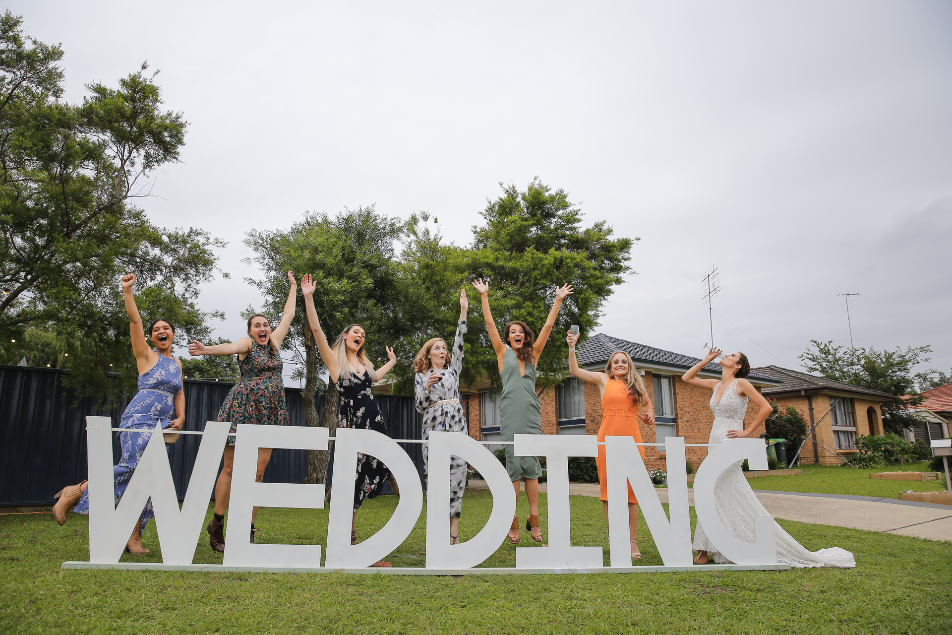 DIY wedding sign with Bridesmaides