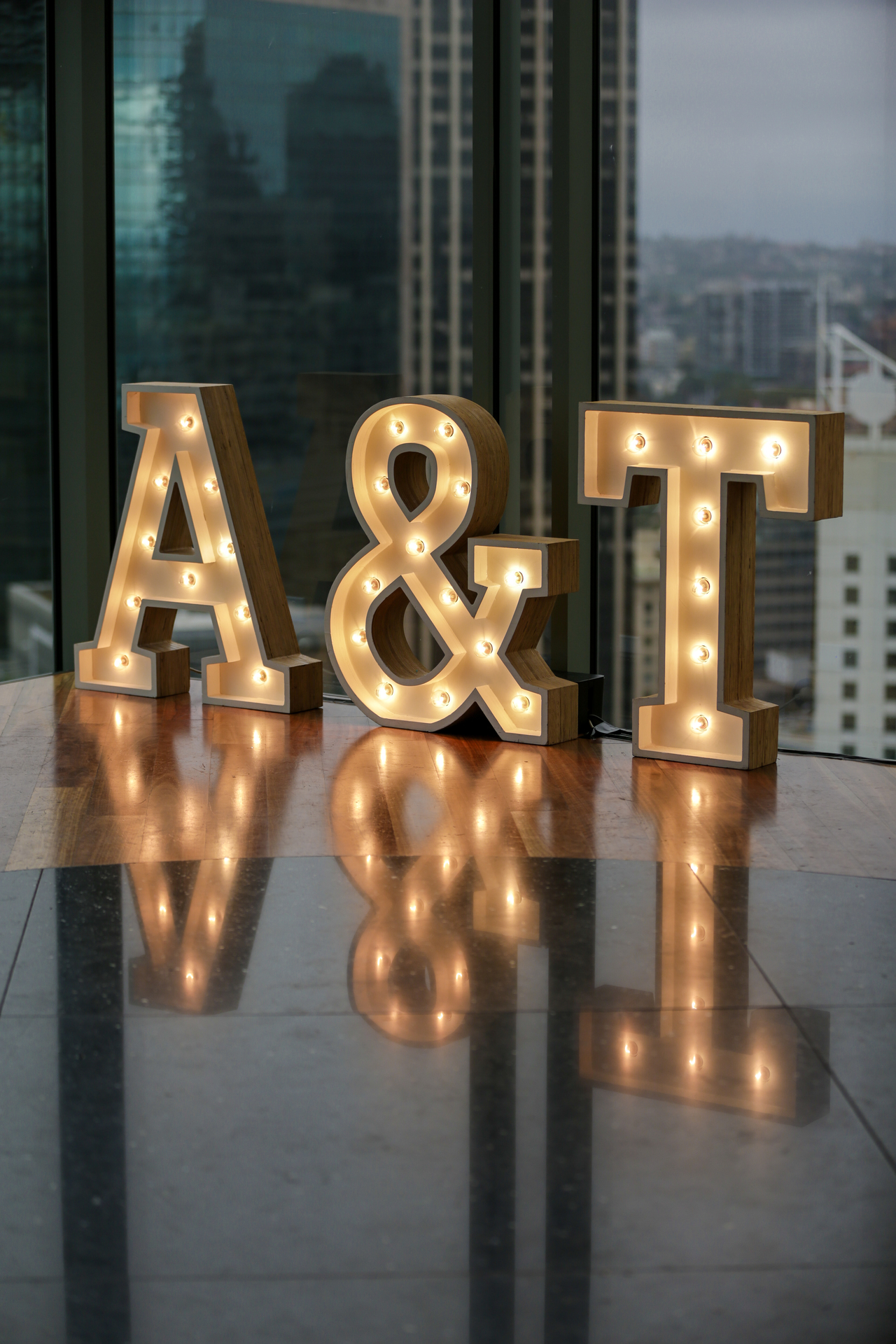 Giant wedding letters with lights 'A & T'