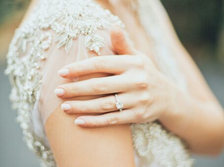 bride wearing diamond wedding ring