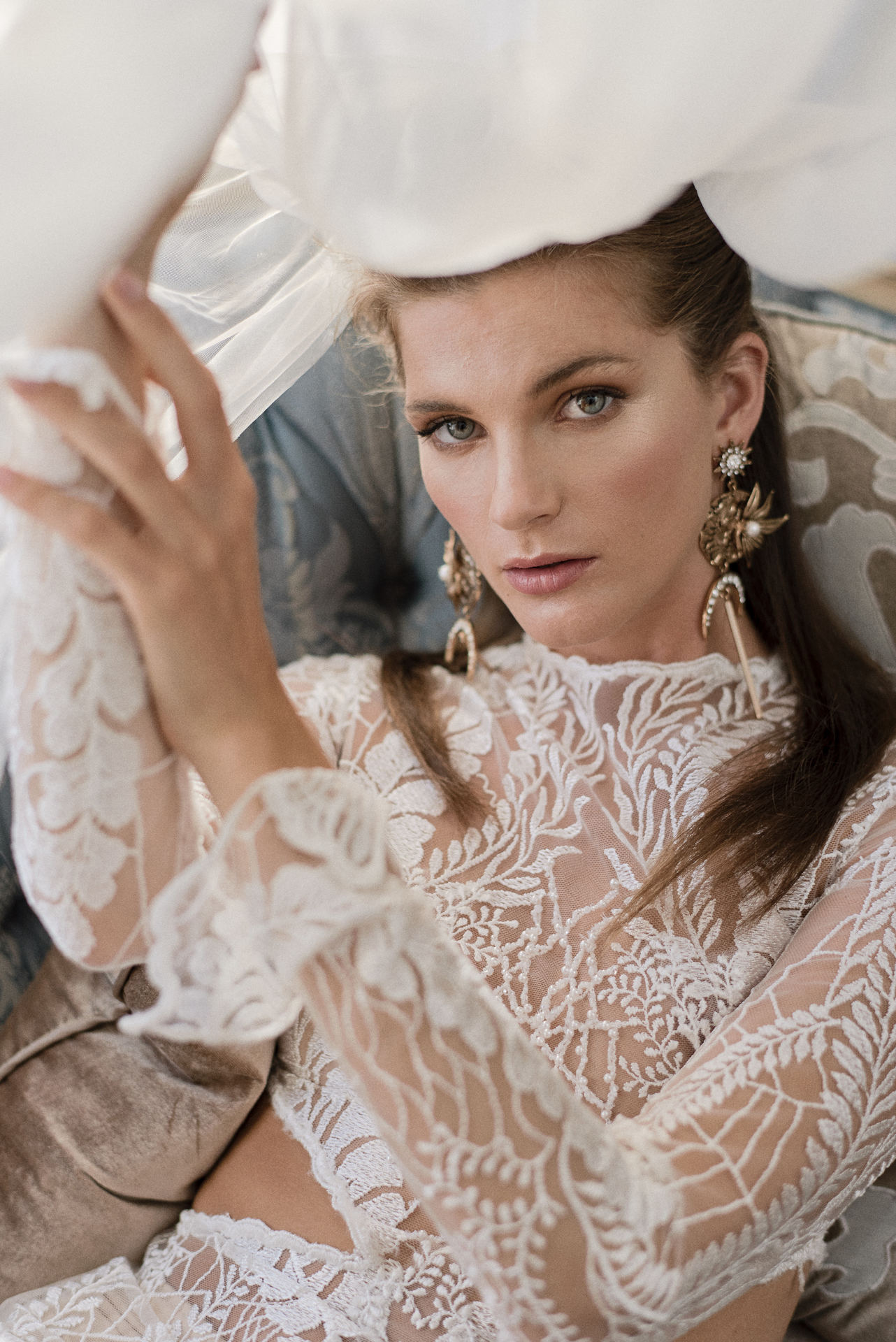 bride in lace wedding dress with veil